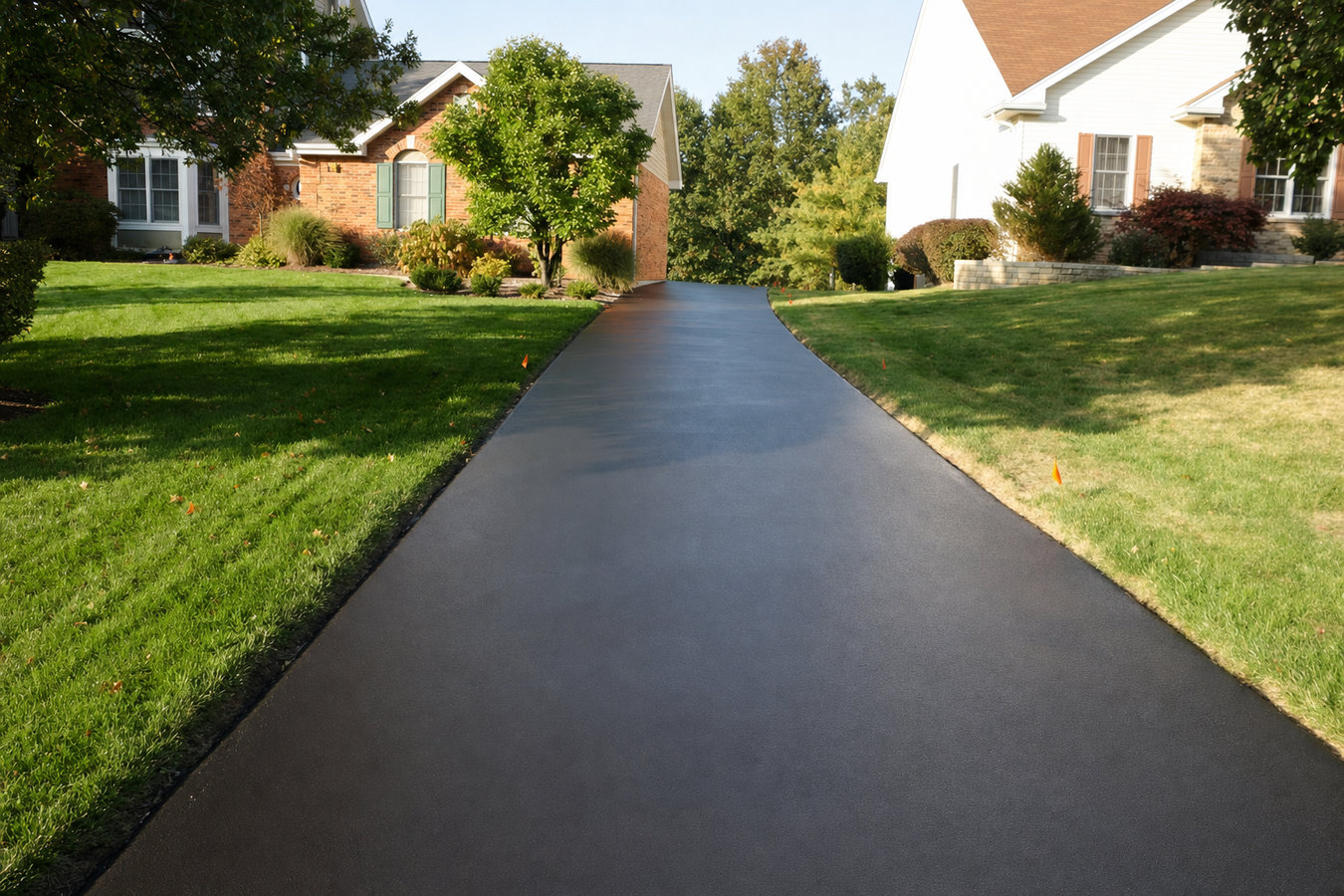 Asphalt sealcoating